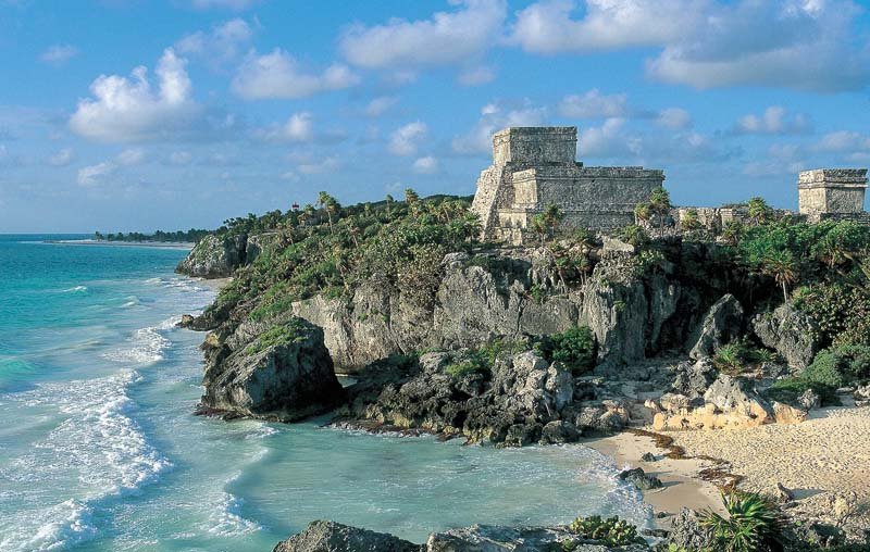 Tulum ruins on the cliff above the beach